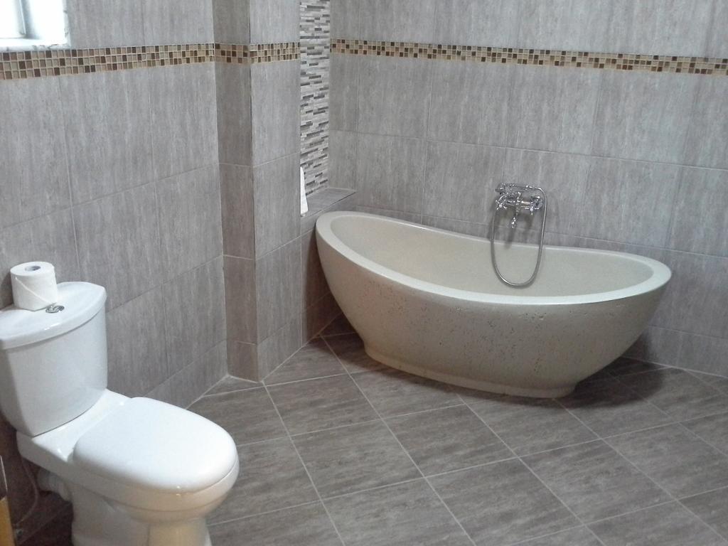Tropical Enclave Hotel Accra Kamer foto